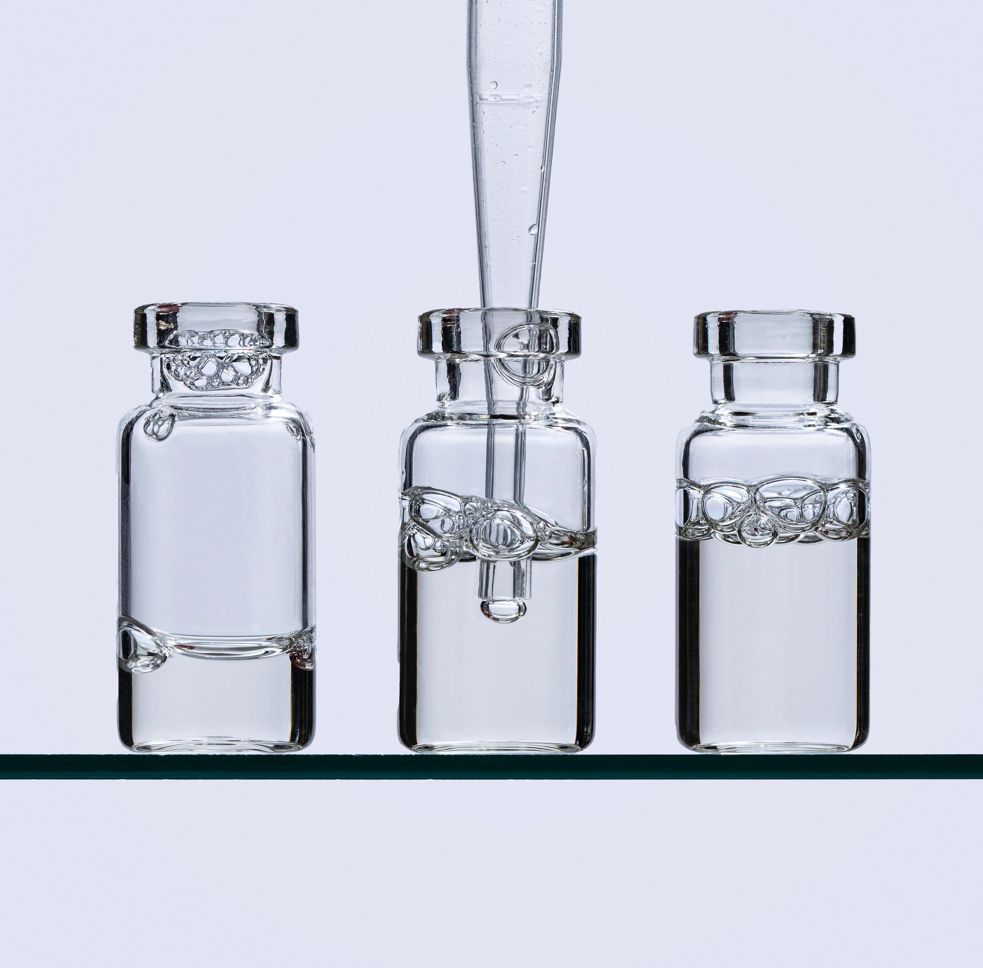 Three Juvasonic cartridge vials shown together