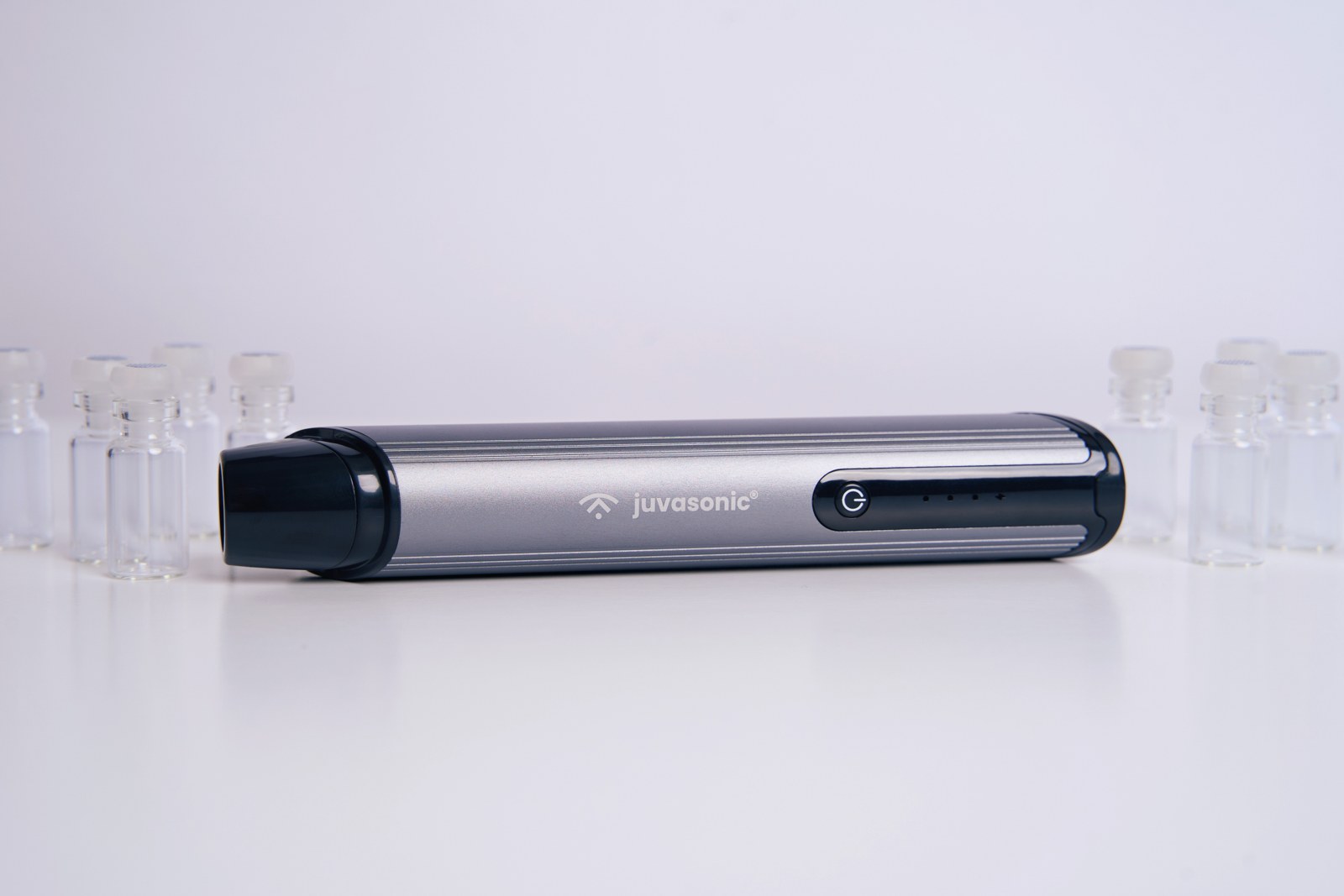 Juvasonic handheld device with serum vials